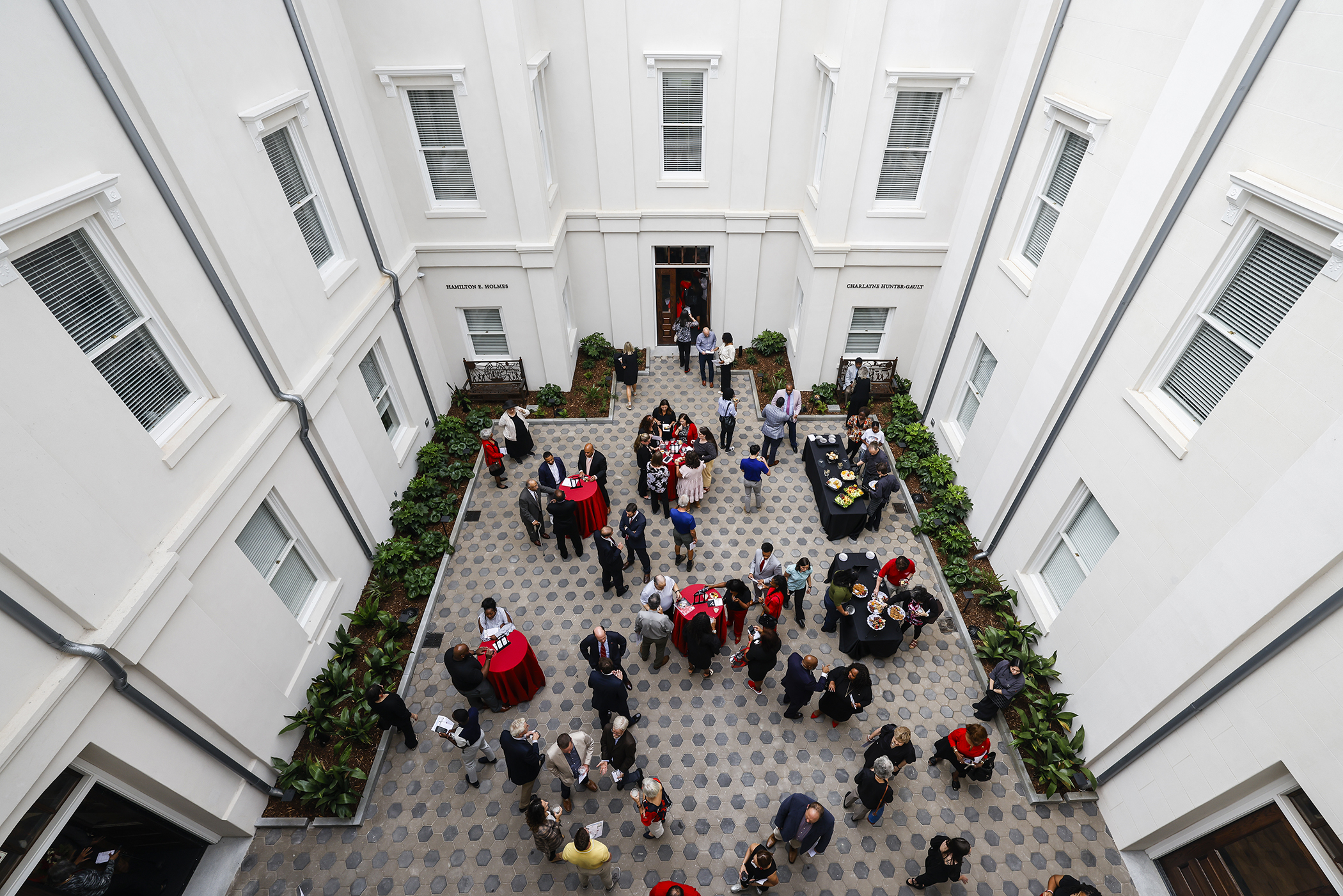 overhead photo of courtyard, with people, day