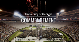 photo of stadium with white text