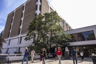 photo of building with students, day