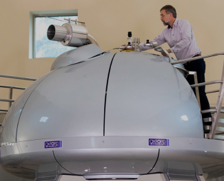 photo of man with MNR machine