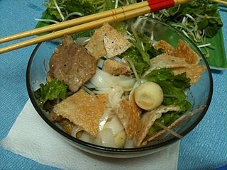 noodle soup with greens, beef and quail eggs