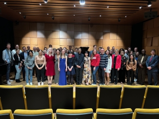 group photo of people on stage