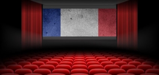 graphic of empty theater interior with French tri-color on screen