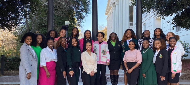 photo of woman at arch, day