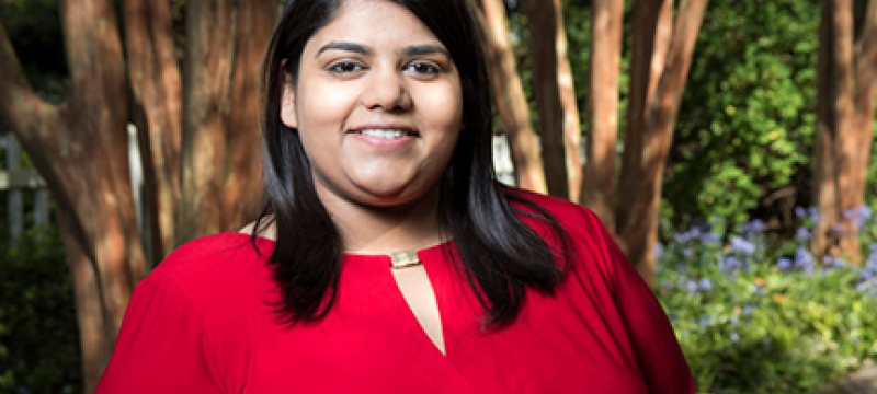 photo of woman outside with trees