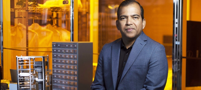 photo of man and clean room laboratory