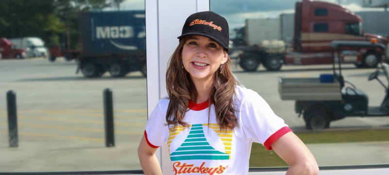 photo of woman outside a truckstop