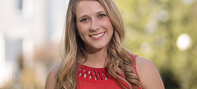 photo of woman with campus background