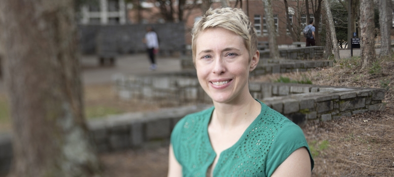 photo of woman outdoors, with trees, day