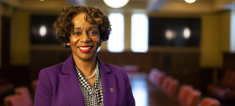 photo of woman in board room