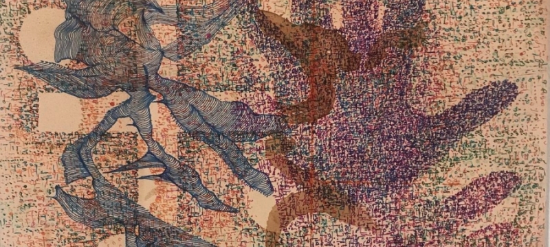 photograph of colorful drawing, with hand shape