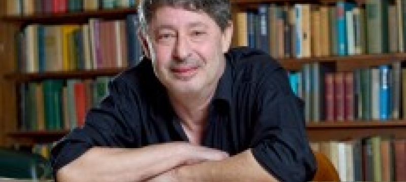 close up with books and table.