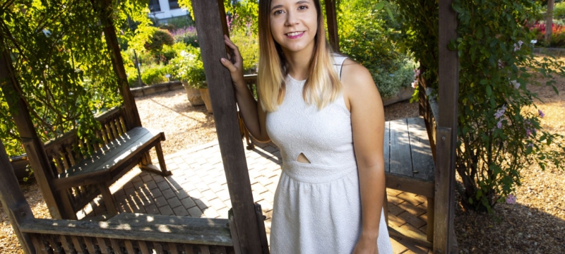 photo of woman with garden pergola 