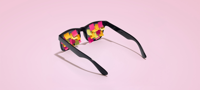 photo of sunglasses with small post-it notes on lenses